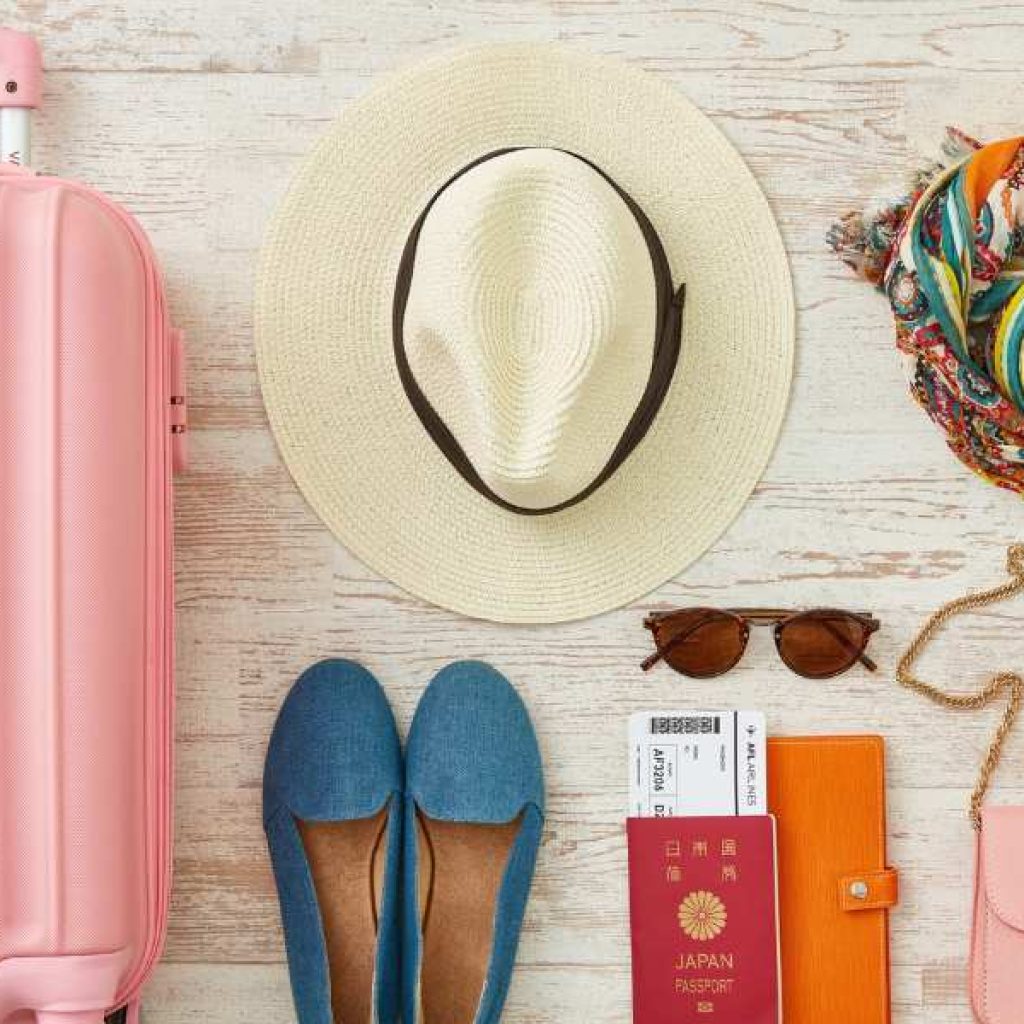 Sri Lanka packing list essentials laid out on bed including lightweight clothes and travel gear