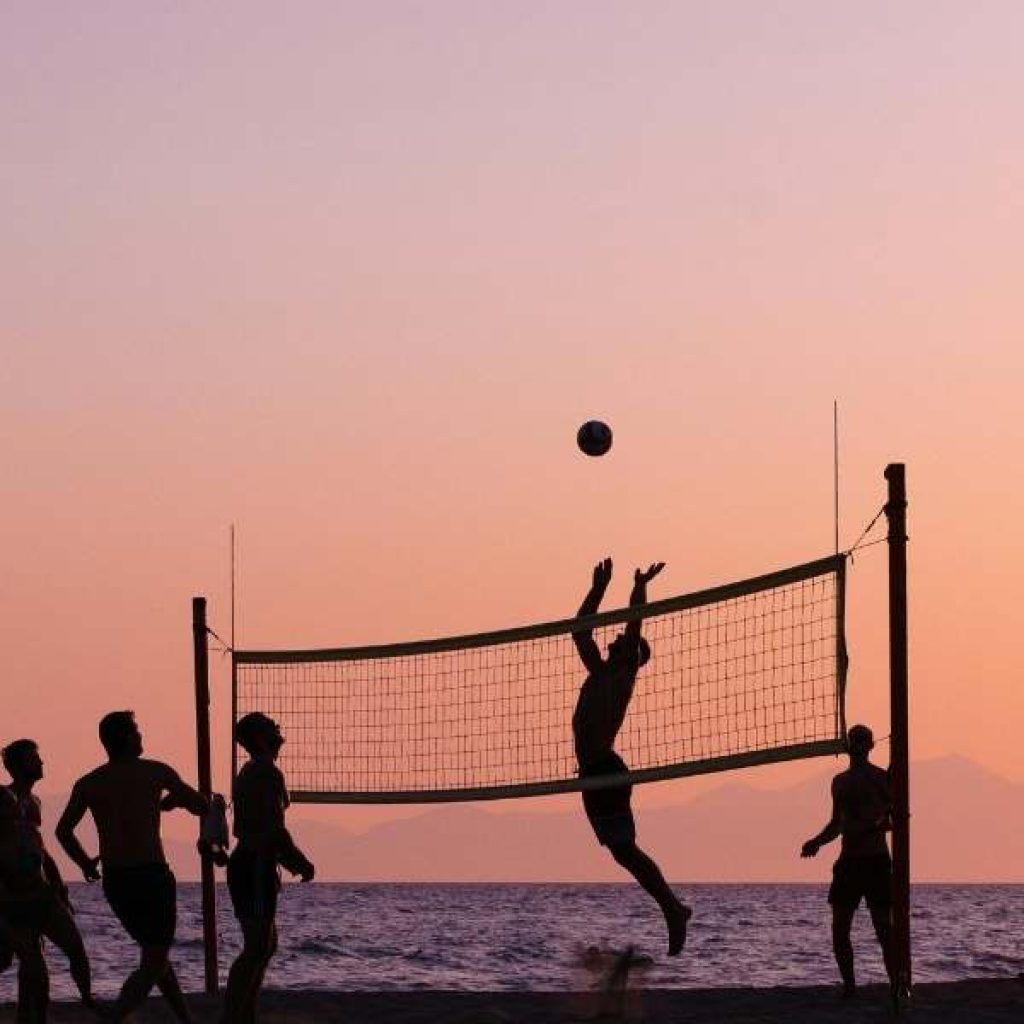 Children playing safely on Bentota beach with parents watching Sri Lanka