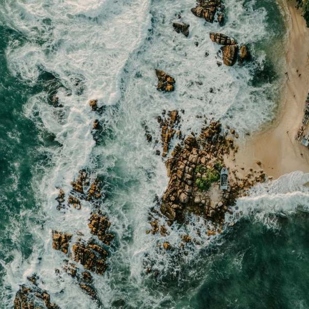 "Budget traveler counting Sri Lankan rupees with local market scene background